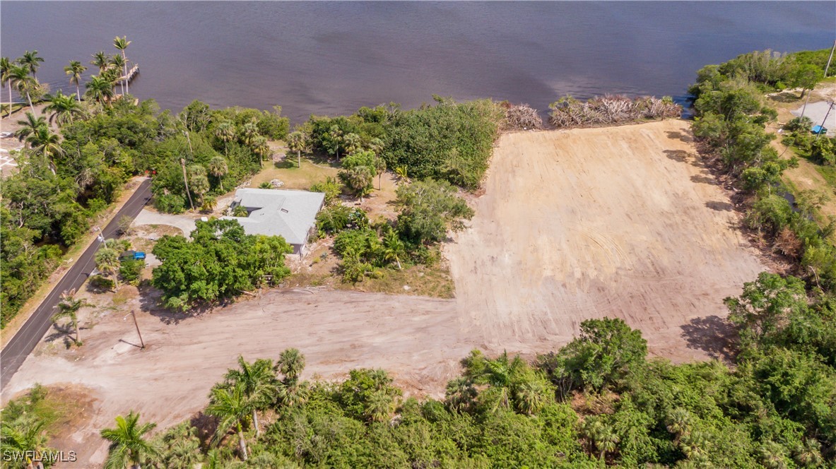 1059 River Road North Fort Myers, FL 33903 - Photo 8 of 15 a view of a garden with a pathway