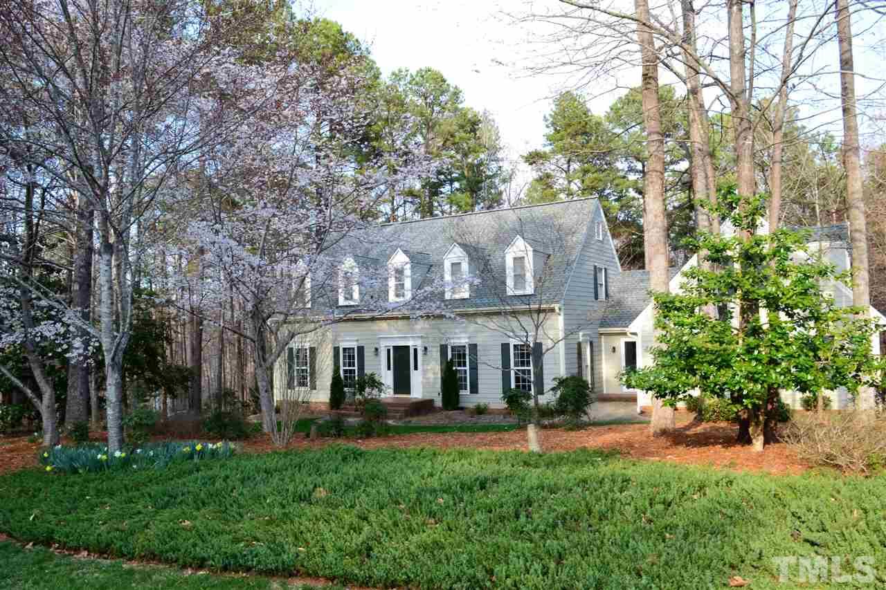 4820 Oak Way Raleigh, NC 27613 - Photo 1 of 25 front view of a house with a yard