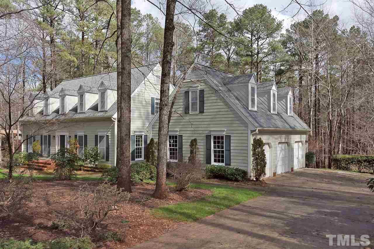 4820 Oak Way Raleigh, NC 27613 - Photo 3 of 25 a front view of a house with garden