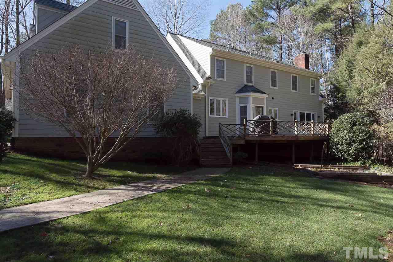 4820 Oak Way Raleigh, NC 27613 - Photo 4 of 25 a view of a house with a yard