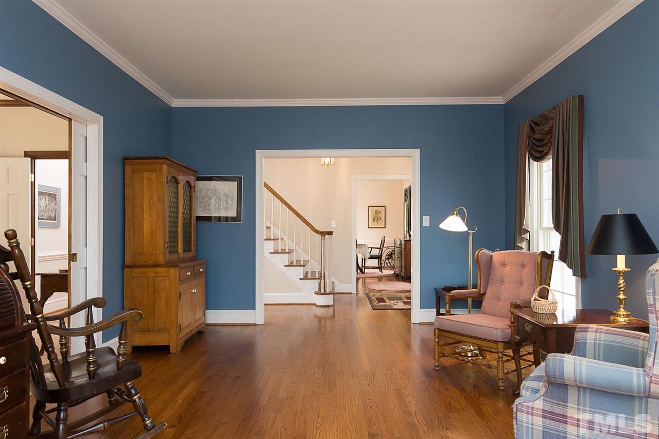 4820 Oak Way Raleigh, NC 27613 - Photo 5 of 25 a living room with furniture and a flat screen tv