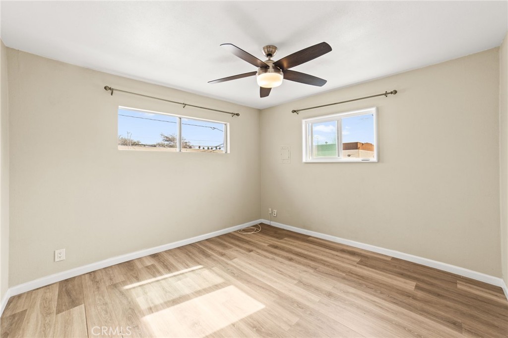 3717 Roosevelt Street Riverside, CA 92503 - Photo 23 of 27 a view of a big room with wooden floor