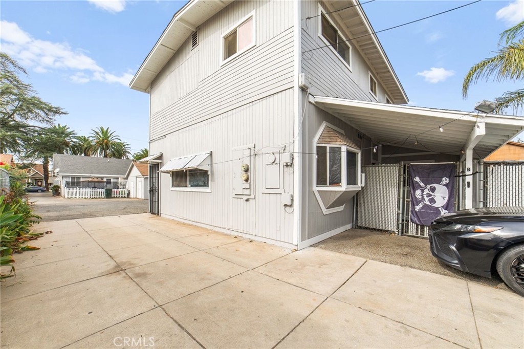3717 Roosevelt Street Riverside, CA 92503 - Photo 9 of 27 a front view of a building with glass door and windows