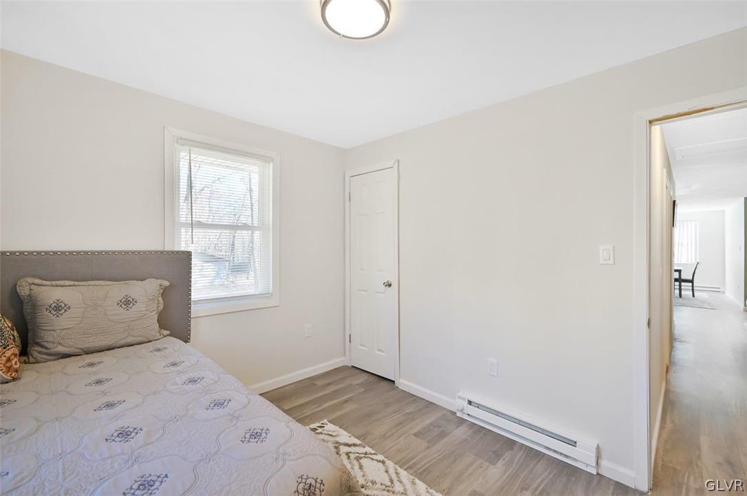 1111 Bracts Road Effort, PA 18330 - Photo 22 of 42 a bedroom with a bed and window