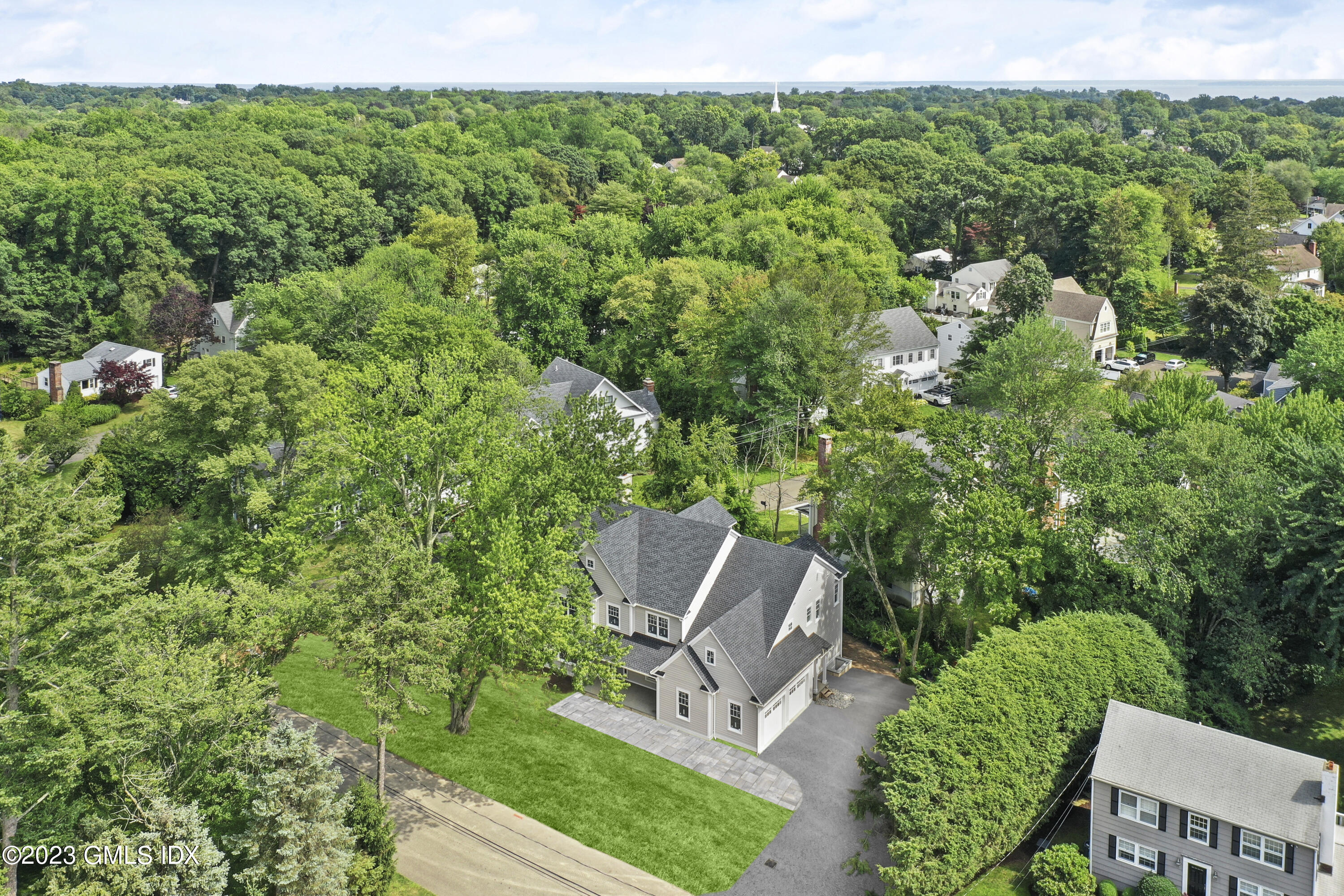 34 Laforge Road Darien, CT 06820 - Photo 3 of 8 an aerial view of a house with a yard