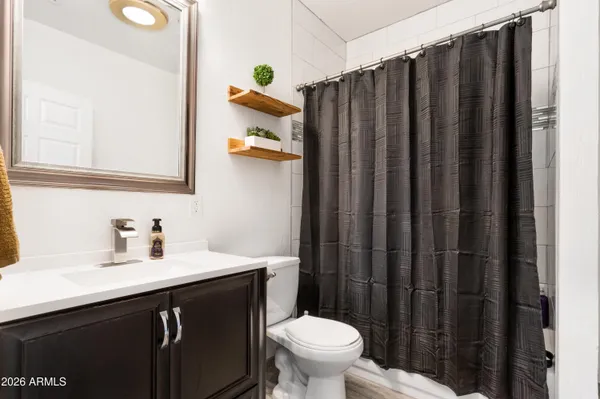 a bathroom with a sink and a toilet