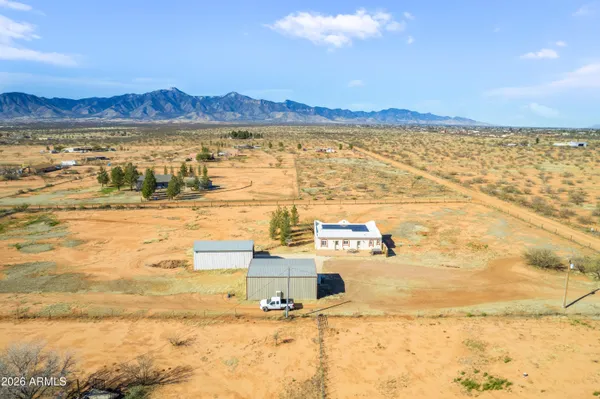 a view of a ocean with a mountain