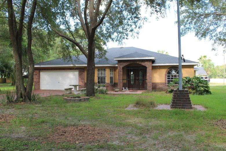 9210 Carey Road Lithia, FL 33547 - Photo 1 of 1 a view of a house with backyard