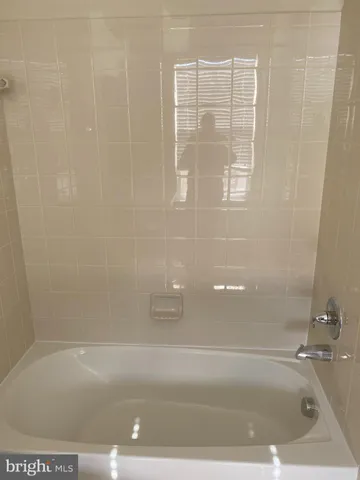 a kitchen with a stove and a sink