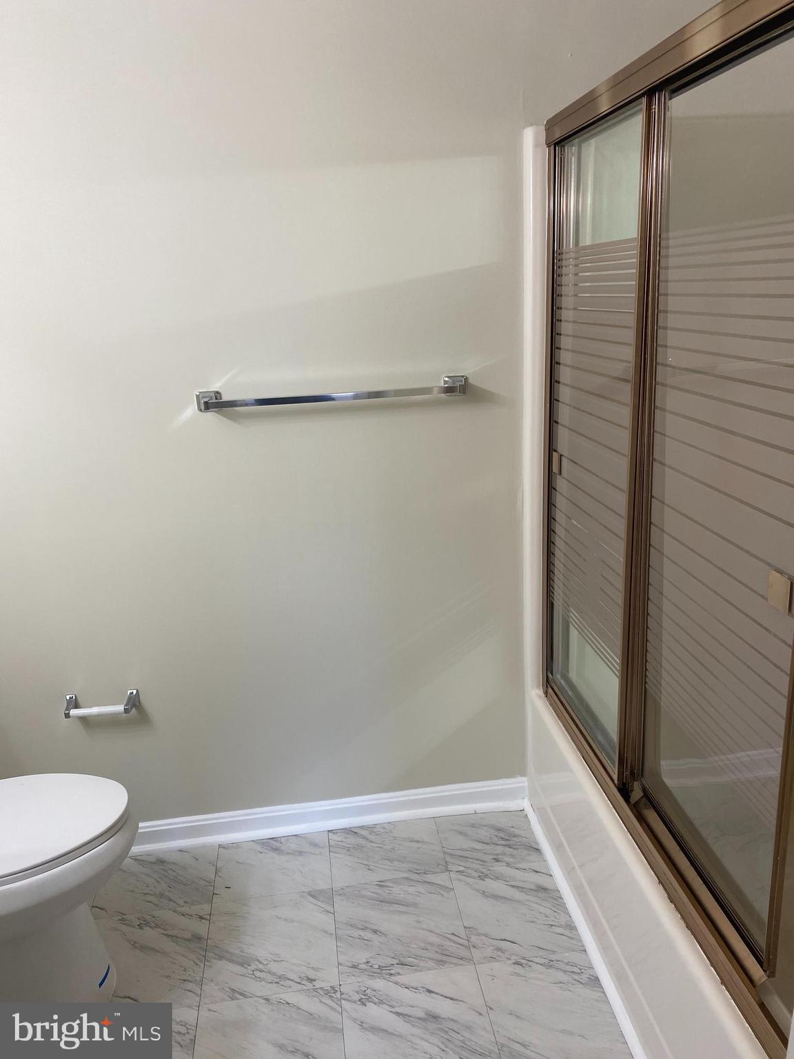 200 Chesterfield Lane, Unit 203 Stafford, VA 22556 - Photo 20 of 27 a bathroom with a toilet and a shower