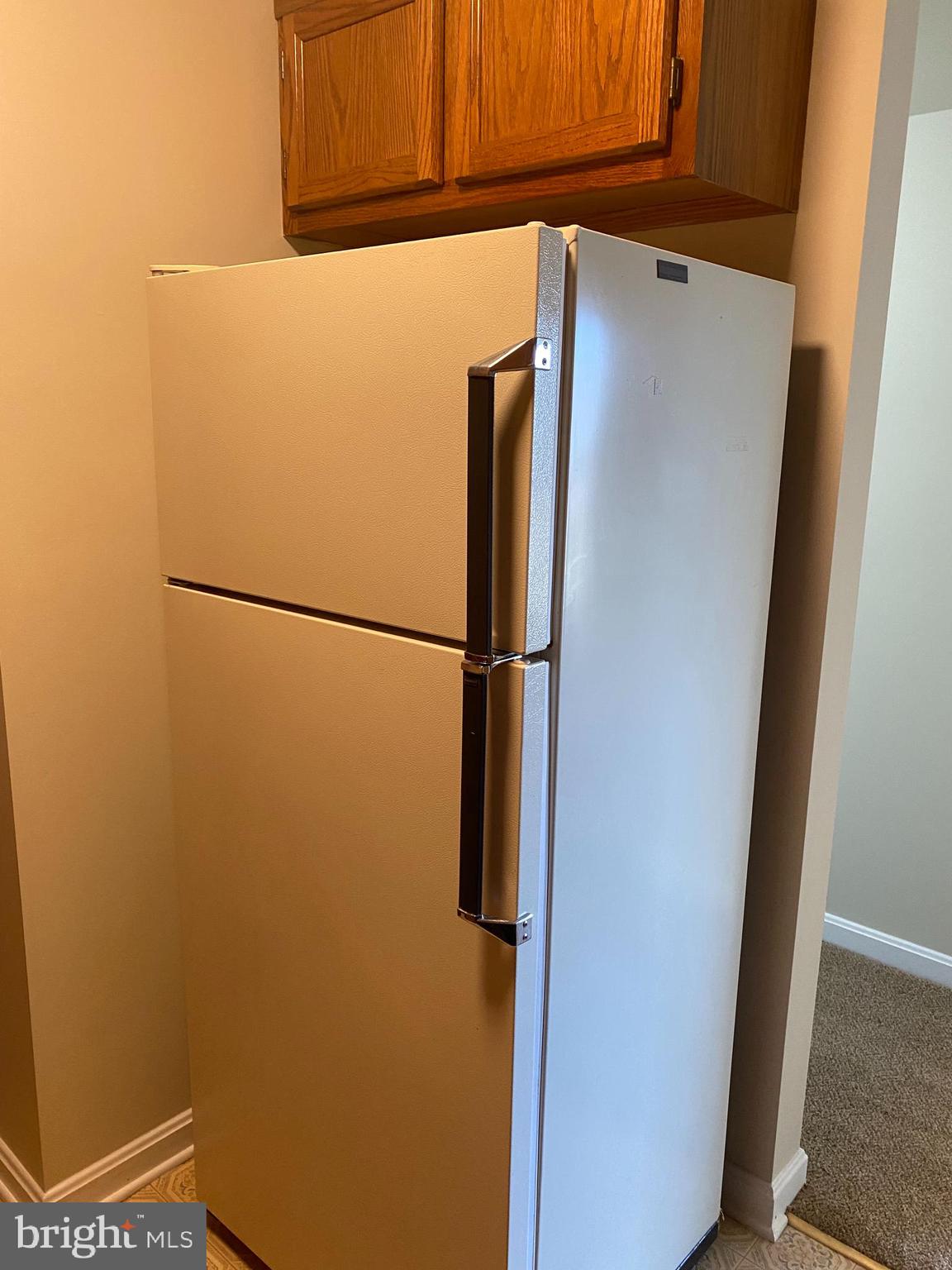200 Chesterfield Lane, Unit 203 Stafford, VA 22556 - Photo 24 of 27 a white refrigerator freezer and a dishwasher