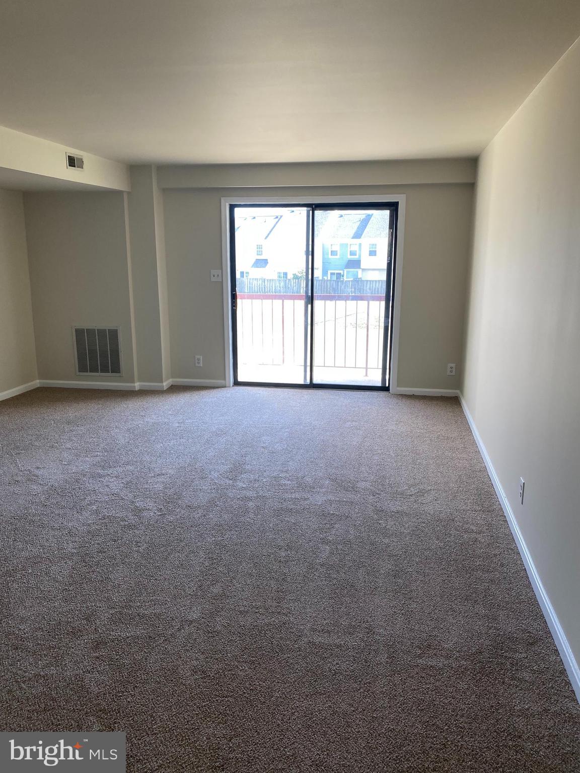 200 Chesterfield Lane, Unit 203 Stafford, VA 22556 - Photo 6 of 27 an empty room with windows