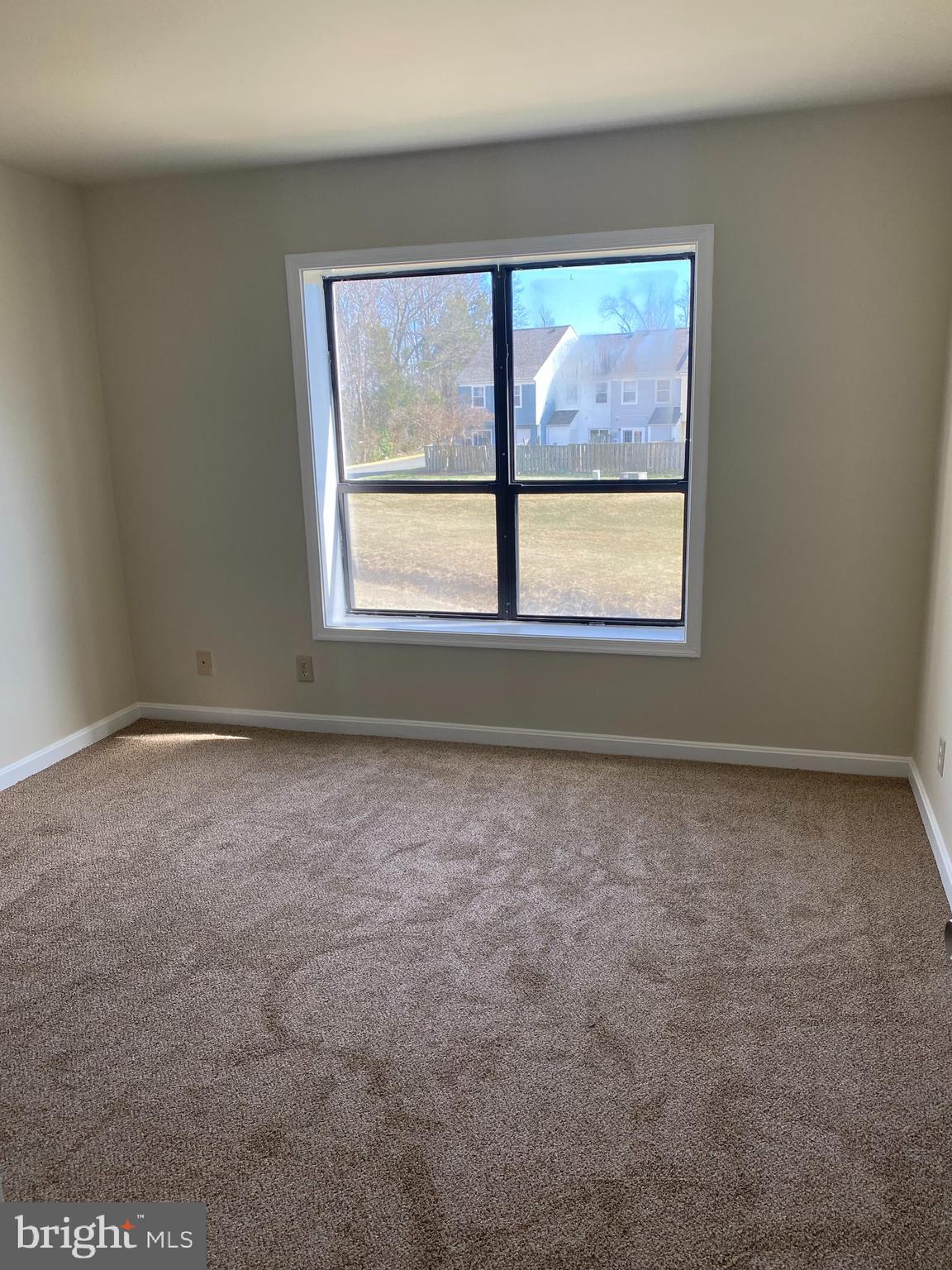 200 Chesterfield Lane, Unit 203 Stafford, VA 22556 - Photo 10 of 27 an empty room with a window
