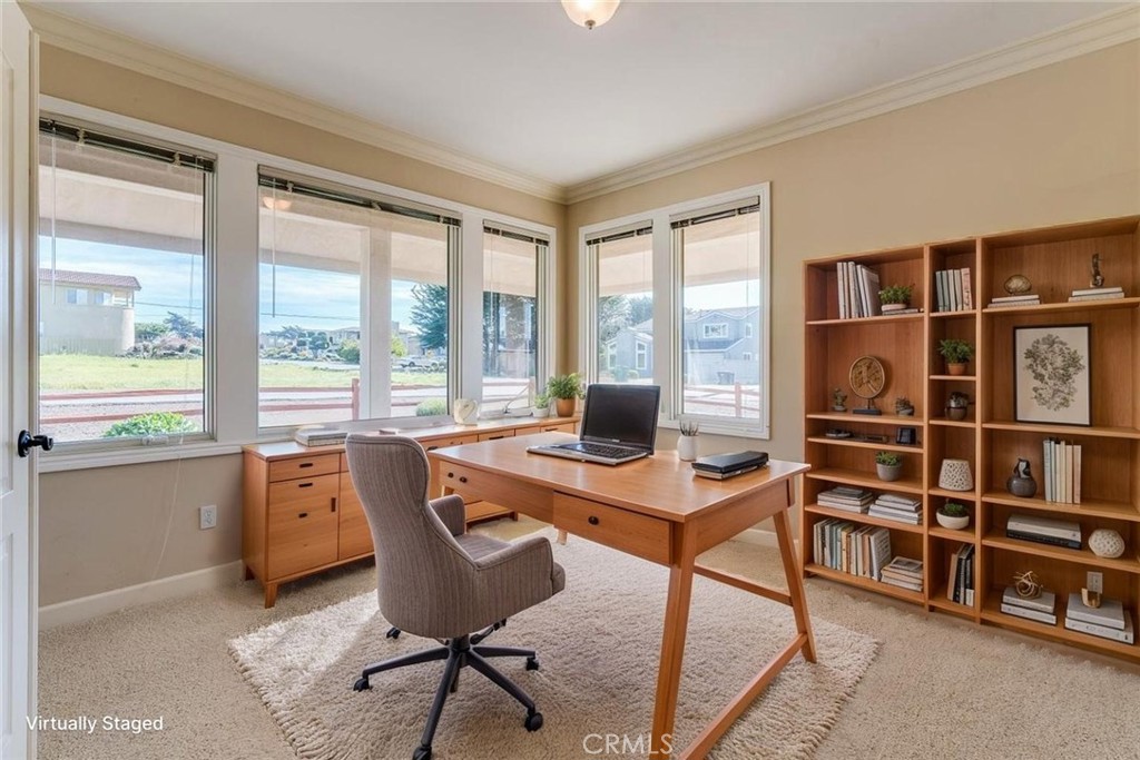 305 Ivar Street Cambria, CA 93428 - Photo 12 of 69 a view of a workspace with furniture and a window