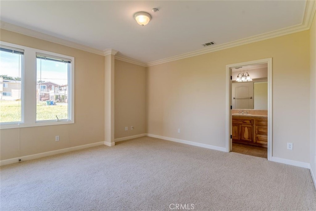 305 Ivar Street Cambria, CA 93428 - Photo 41 of 69 an empty room with windows and closet