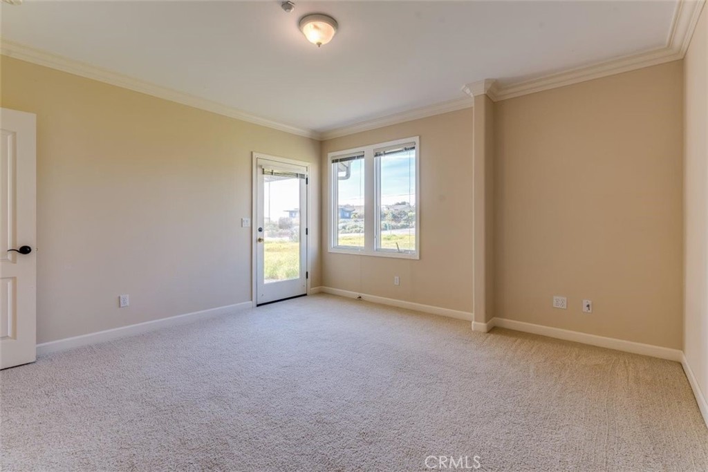 305 Ivar Street Cambria, CA 93428 - Photo 44 of 69 an empty room with windows