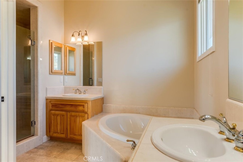 305 Ivar Street Cambria, CA 93428 - Photo 53 of 69 a bathroom with a sink and a mirror