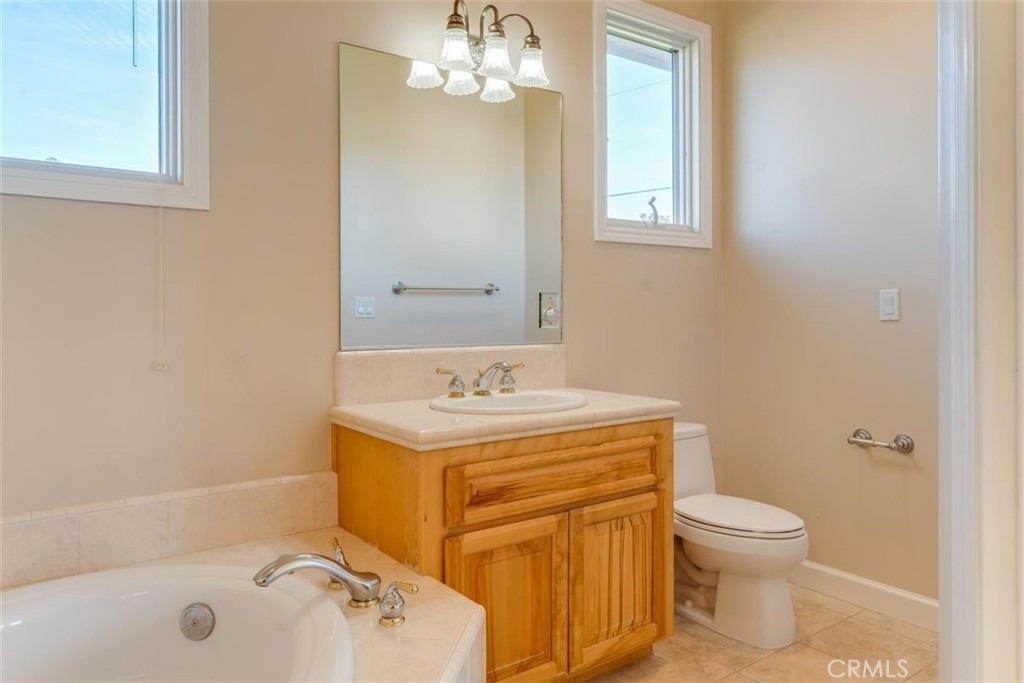305 Ivar Street Cambria, CA 93428 - Photo 54 of 69 a bathroom with a sink a toilet and shower