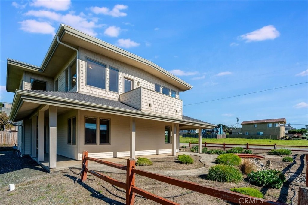 305 Ivar Street Cambria, CA 93428 - Photo 59 of 69 a front view of a house with garden