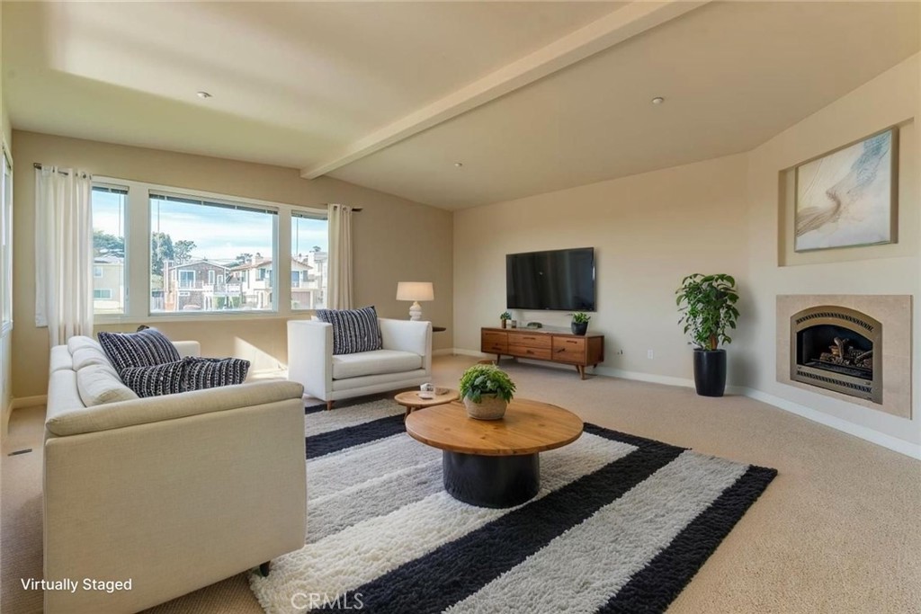 305 Ivar Street Cambria, CA 93428 - Photo 7 of 69 a living room with furniture and a fireplace