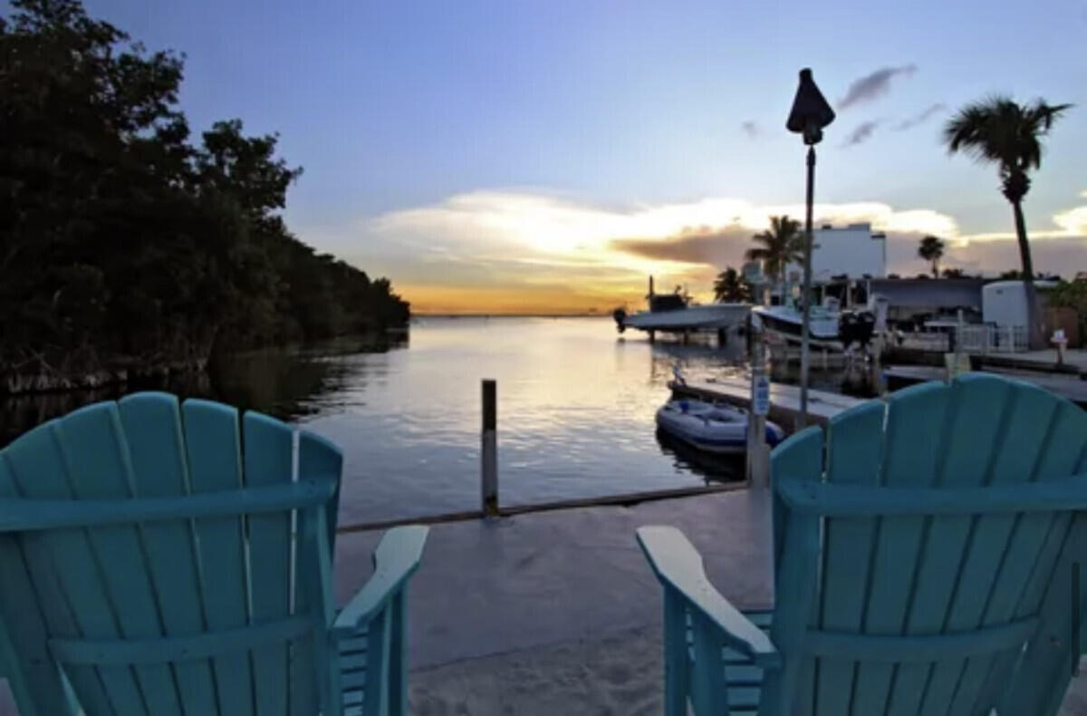 325 Calusa Street, Unit 359 Key Largo, FL 33037 - Photo 42 of 52 a view of a balcony with chairs