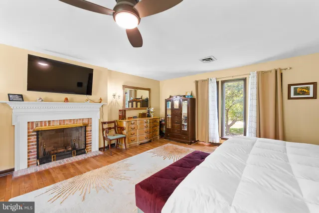a bathroom with a toilet sink and shower