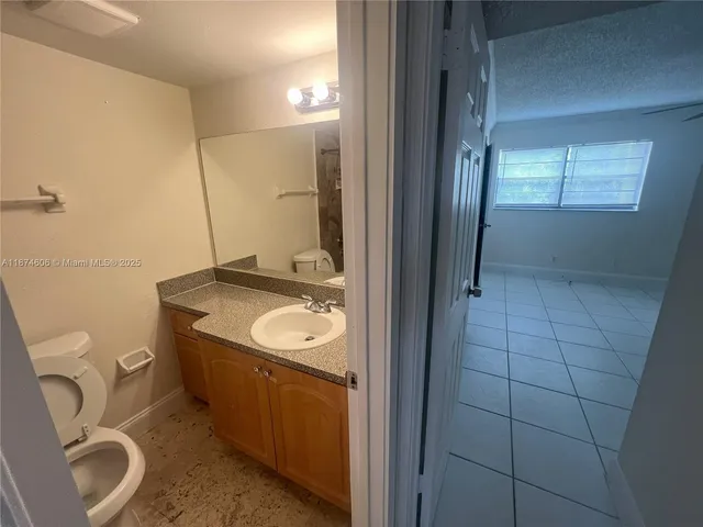 a bathroom with a sink and a toilet