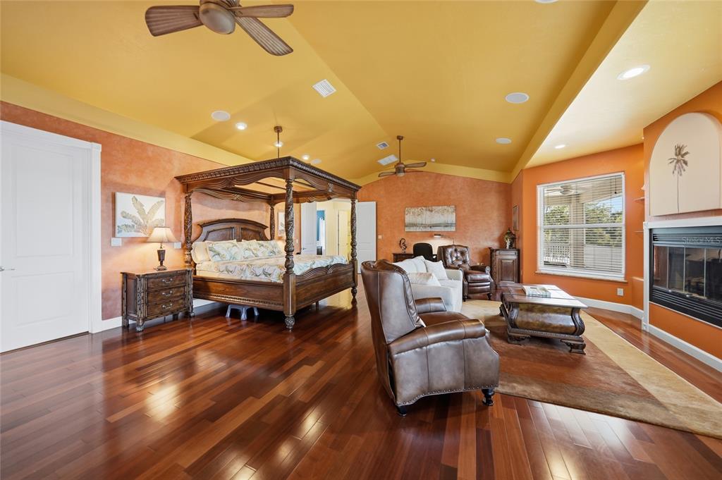 8635 Southwest Riverside Drive Arcadia, FL 34269 - Photo 19 of 70 a living room with furniture and a fireplace