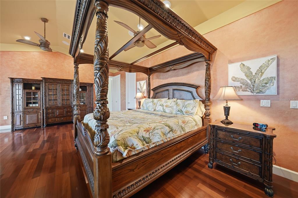 8635 Southwest Riverside Drive Arcadia, FL 34269 - Photo 21 of 70 a bed sitting in a bedroom next to a window