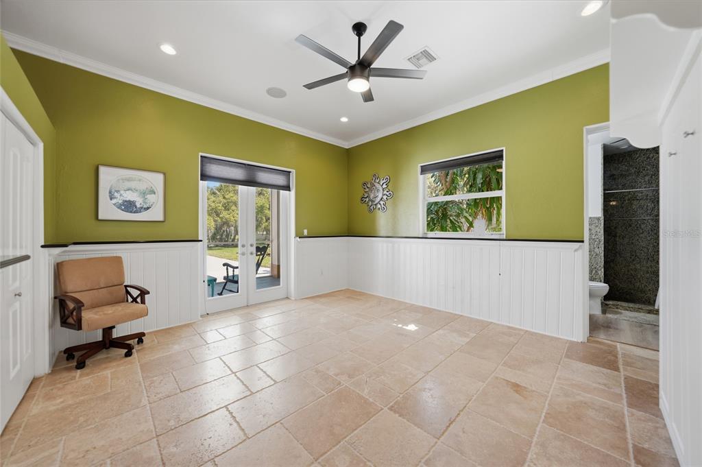 8635 Southwest Riverside Drive Arcadia, FL 34269 - Photo 31 of 70 a view of a livingroom with workspace and a couch
