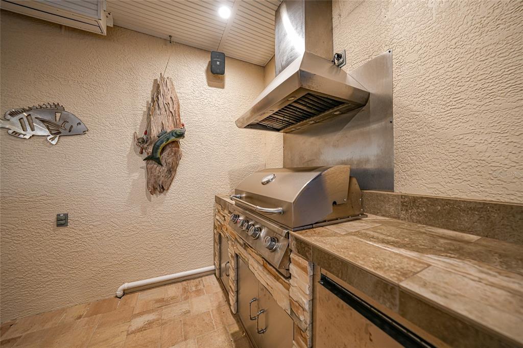 8635 Southwest Riverside Drive Arcadia, FL 34269 - Photo 41 of 70 a view of a storage and utility room with racks on the wall