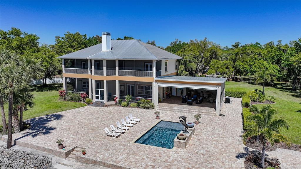 8635 Southwest Riverside Drive Arcadia, FL 34269 - Photo 62 of 70 a front view of a house with a yard