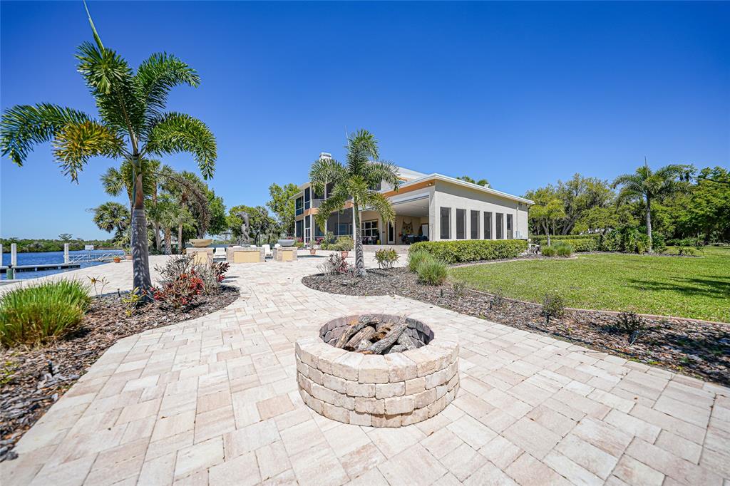 8635 Southwest Riverside Drive Arcadia, FL 34269 - Photo 63 of 70 a view of a house with backyard and sitting area
