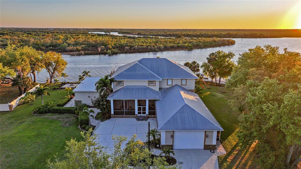 8635 Southwest Riverside Drive Arcadia, FL 34269 - Photo 68 of 70 an aerial view of house with yard and ocean view