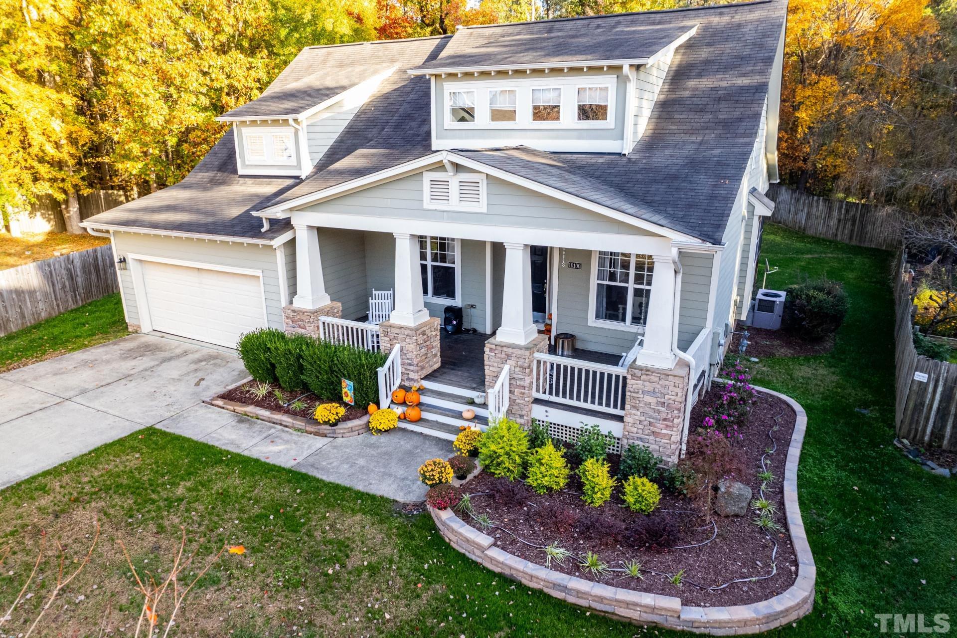 10100 Darling Street Raleigh, NC 27613 - Photo 1 of 24 a view of a house with a yard patio and a slide