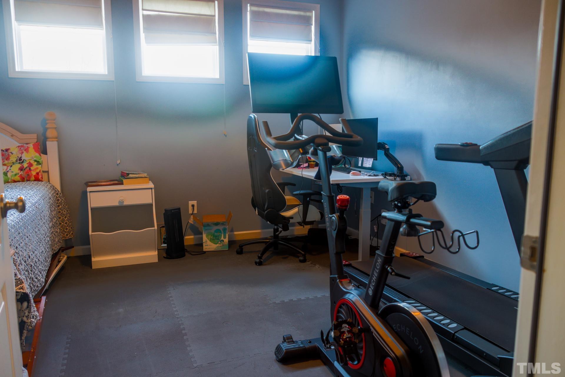 10100 Darling Street Raleigh, NC 27613 - Photo 19 of 24 a view of a room with gym equipment
