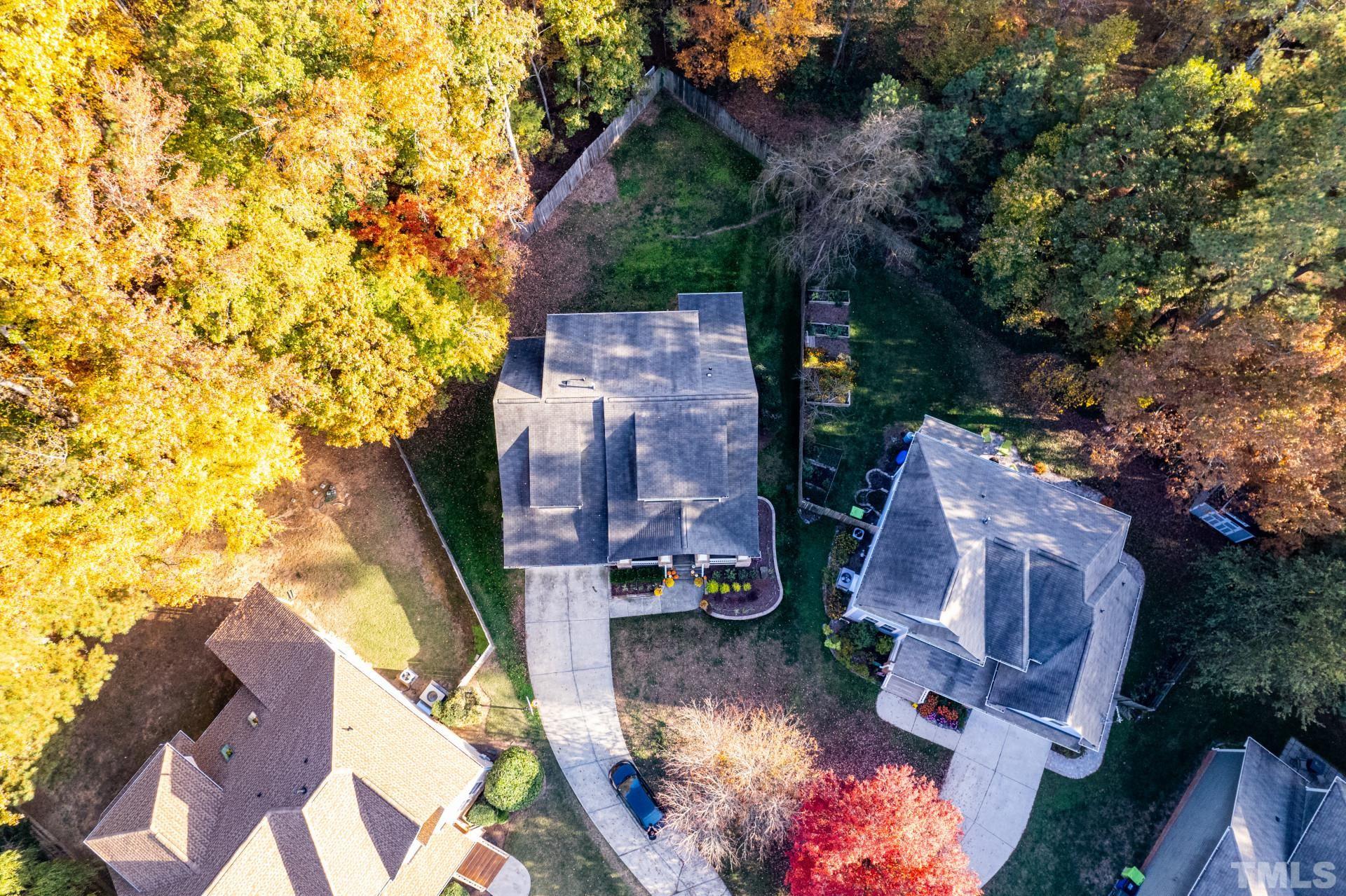 10100 Darling Street Raleigh, NC 27613 - Photo 4 of 24 an aerial view of a house with a yard