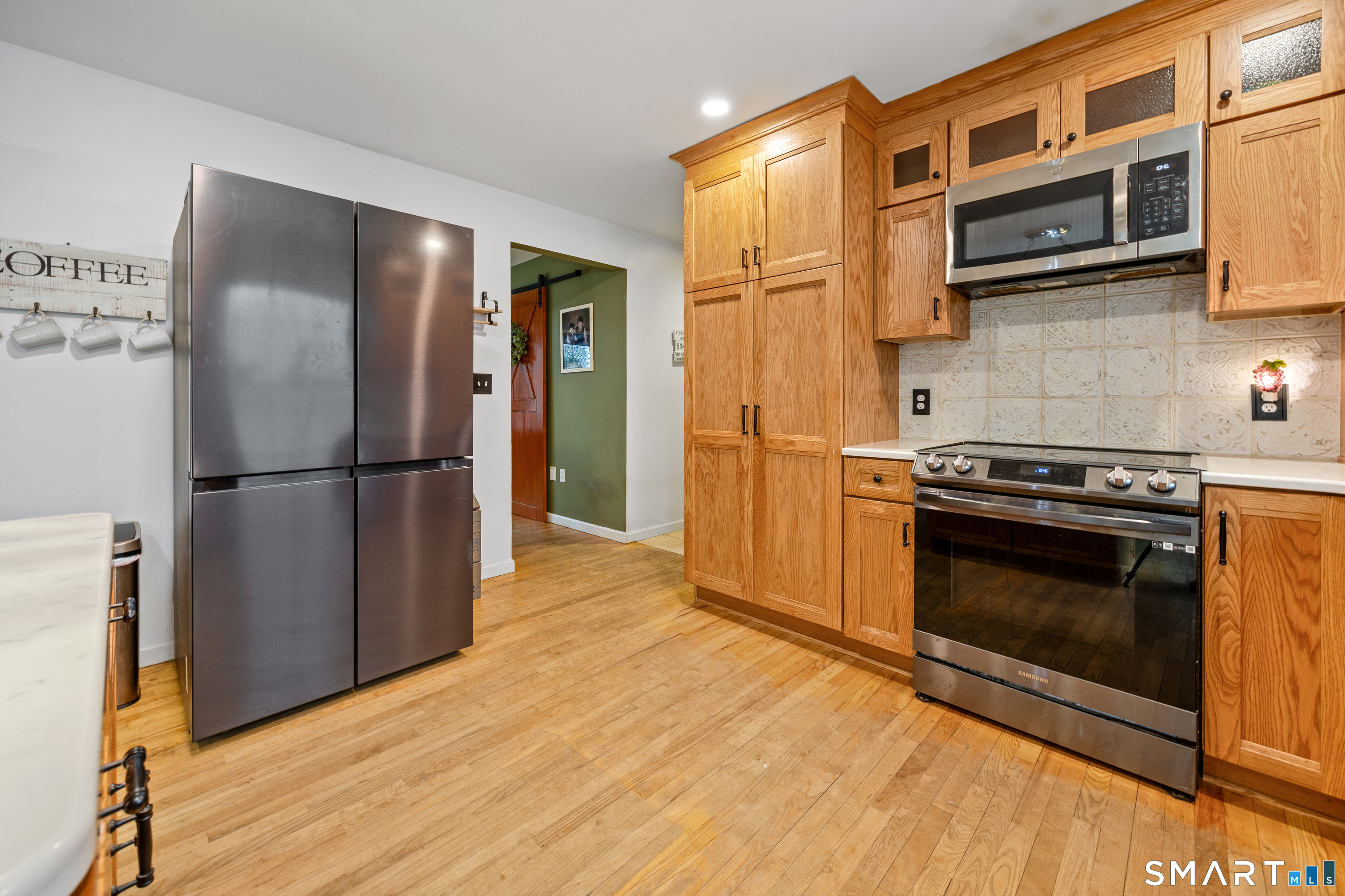 197 Preston Road Plymouth, CT 06786 - Photo 9 of 39 a kitchen with stainless steel appliances granite countertop a refrigerator stove and sink