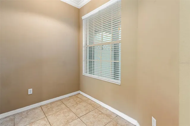 a kitchen with stainless steel appliances granite countertop a stove a refrigerator and a sink