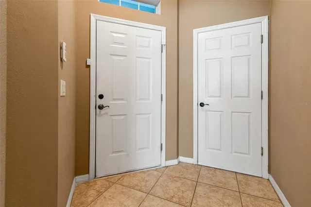 a bathroom with a sink mirror and toilet