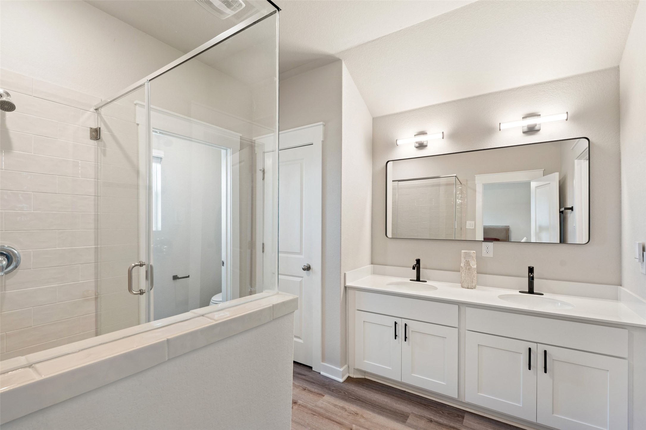 2251 Rocoso Trail Leander, TX 78641 - Photo 12 of 24 a bathroom with a double vanity sink mirror and
