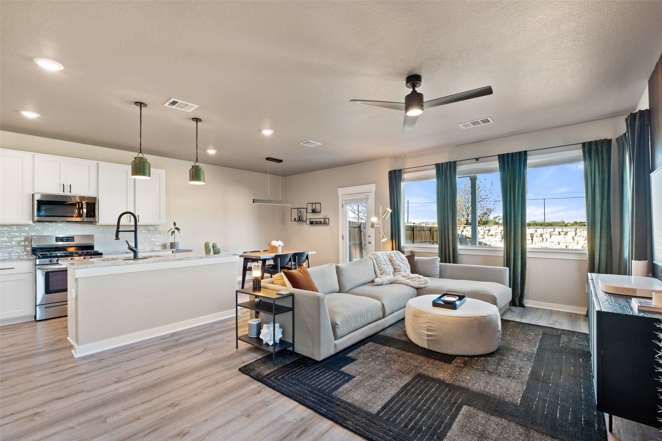 2251 Rocoso Trail Leander, TX 78641 - Photo 7 of 24 a living room with furniture and a wooden floor