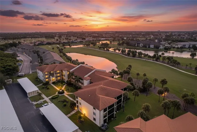 an aerial view of a house with outdoor space