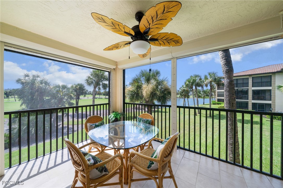 12581 Kelly Sands Way, Unit 518 Fort Myers, FL 33908 - Photo 26 of 33 a view of a chairs and table in the balcony