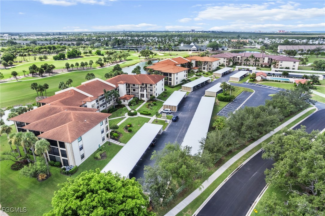 12581 Kelly Sands Way, Unit 518 Fort Myers, FL 33908 - Photo 7 of 33 an aerial view of multiple house