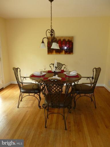 14424 Cantrell Road Silver Spring, MD 20905 - Photo 1 of 18 a view of a dining room with furniture and a table