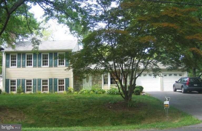 14424 Cantrell Road Silver Spring, MD 20905 - Photo 18 of 18 a front view of a house with a garden