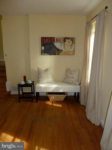 14424 Cantrell Road Silver Spring, MD 20905 - Photo 5 of 18 a living room with furniture and a table