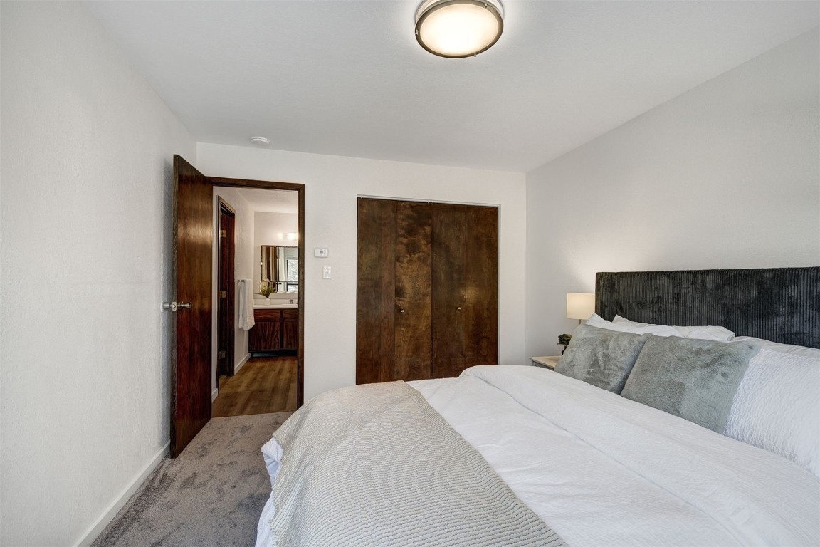 112 La Bonte Street, Unit 208 Dillon, CO 80435 - Photo 12 of 25 a bedroom with bed and window