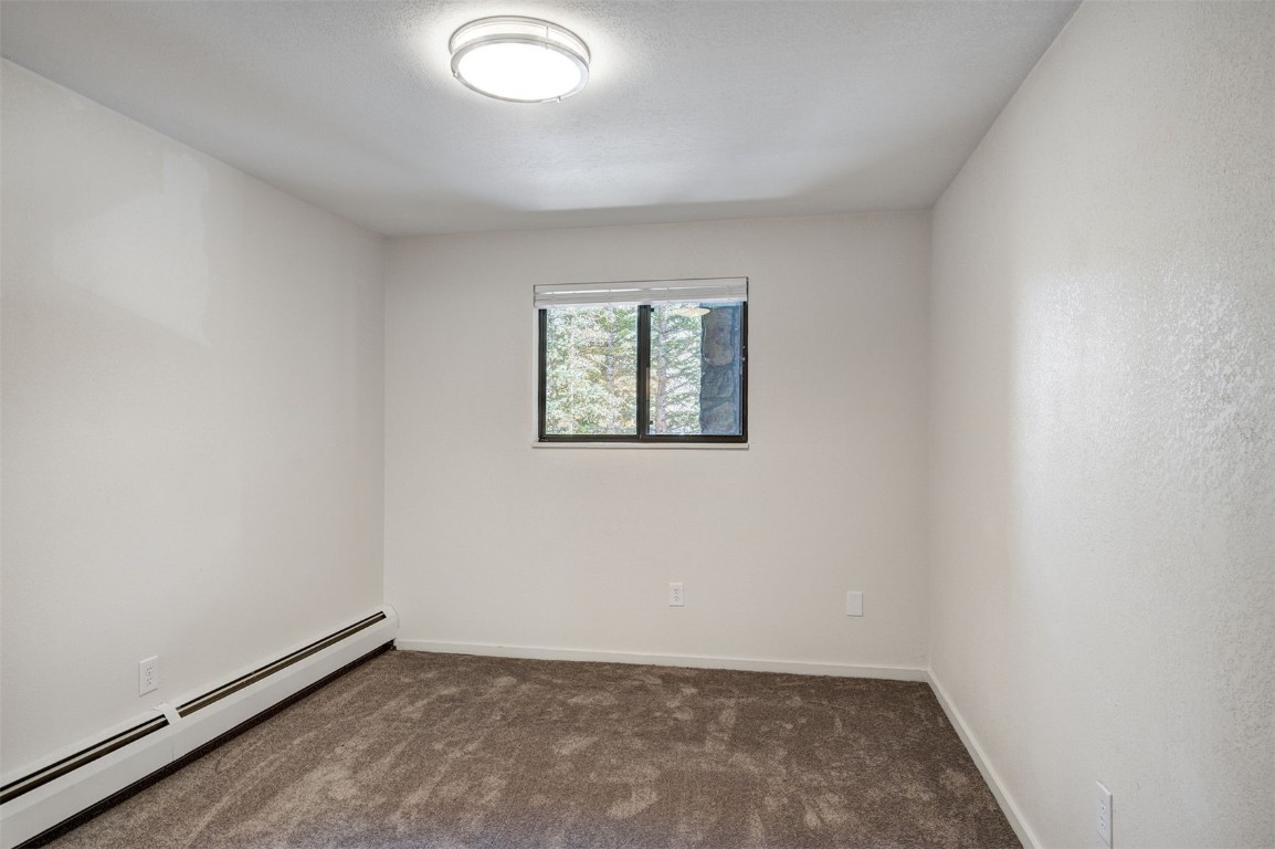 112 La Bonte Street, Unit 208 Dillon, CO 80435 - Photo 15 of 25 an empty room with windows